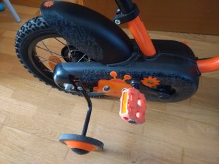 Bicicleta Btwin Naranja con Ruedines