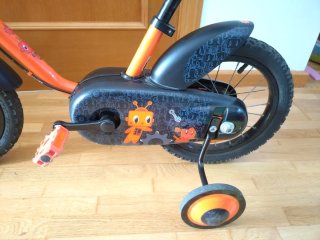 Bicicleta Btwin Naranja con Ruedines