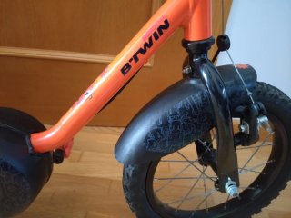 Bicicleta Btwin Naranja con Ruedines