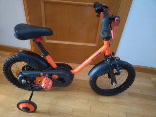 Bicicleta Btwin Naranja con Ruedines
