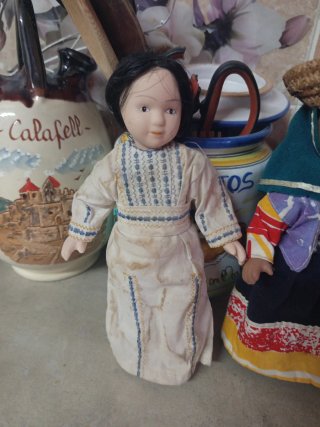 Bambole di porcellana artigianali