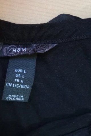 Blusa negra H&M sin mangas con volantes Talla L