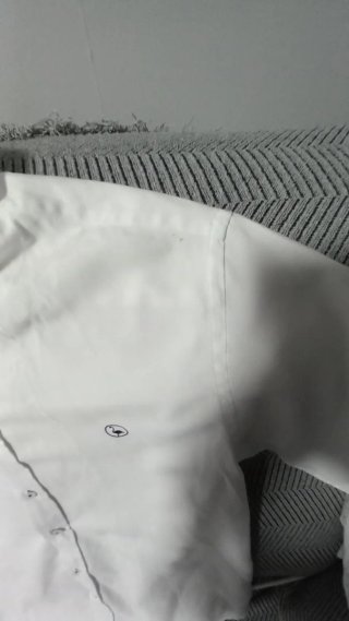 Camisa blanca con logo flamenco