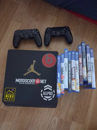 PS4 (PlayStation 4) Negra + 2 Mandos y Juegos