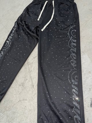 Pantalón chándal negro con brillantes