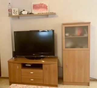 Mueble salón madera y cristal