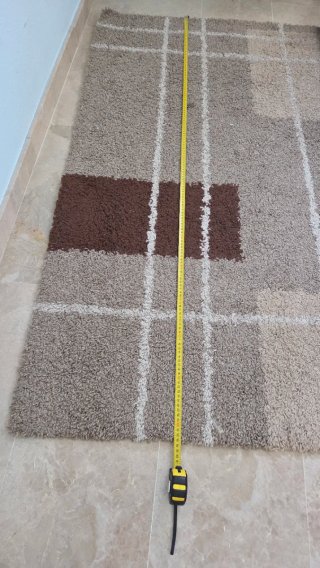 Alfombra beige y marrón 232x163