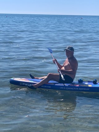 Tabla de surf y kayak inflable con diseño marino