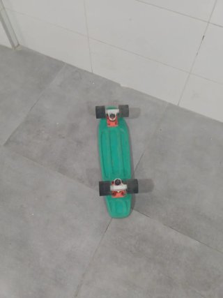 Monopatín verde