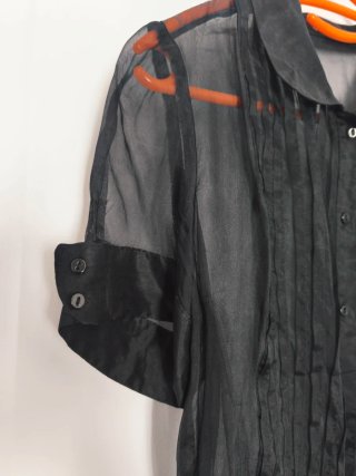 Blusa negra manga corta transparente