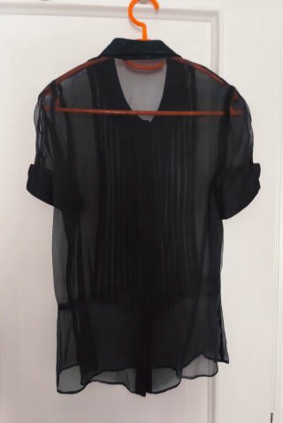 Blusa negra manga corta transparente