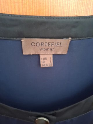 Blusa Cortefiel azul marino con volantes