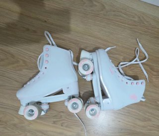 Patines 4 ruedas blancos y rosas talla 38