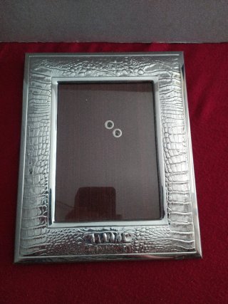 Cornice grande argento laminato