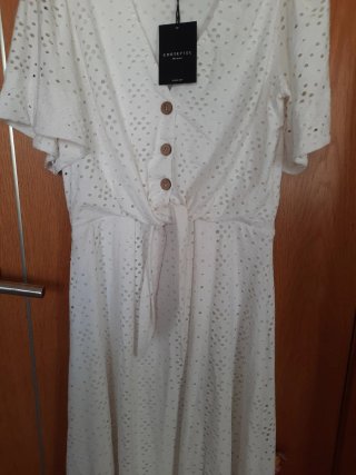 Vestido midi  blanco ibicenco cortefiel