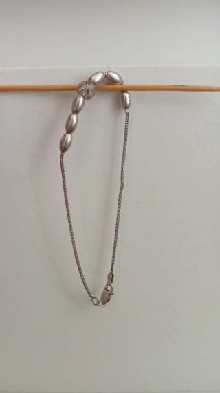 Pulsera de plata con cuentas ovaladas
