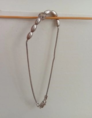 Pulsera de plata con cuentas ovaladas