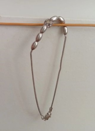 Pulsera de plata con cuentas ovaladas