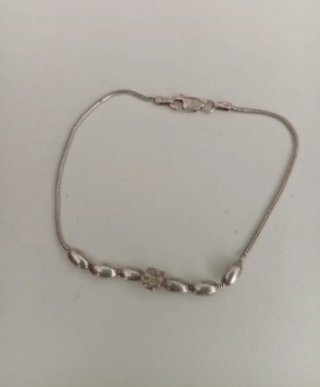 Pulsera de plata con cuentas ovaladas
