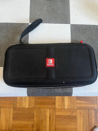 Nintendo Switch Lite Verde con funda original