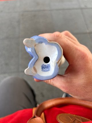 Figura porcelana niño con pez