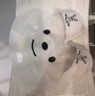Alfombra para lavar pies con diseño de cara sonrie