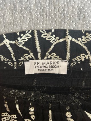 Mono negro niña estampado palmeras
