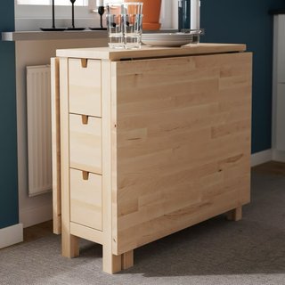 Mesa plegable madera Ikea con cajones.