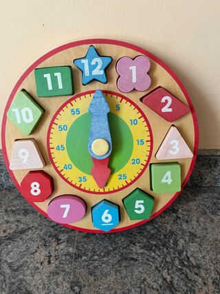 Reloj de madera educativo para niños