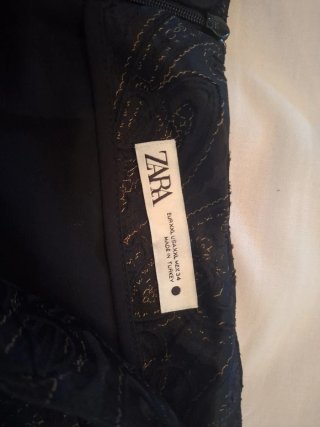 Falda Zara corta con flecos y estampado