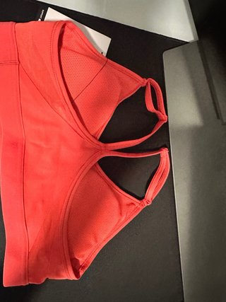 Top deportivo Nike rosa/rojo talla M