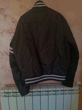 Giubbino nero uomo bomber firmato "Moncler".