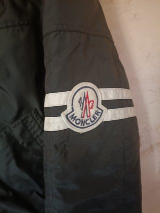Giubbino nero uomo bomber firmato "Moncler".