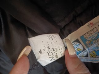 Giubbino nero uomo bomber firmato "Moncler".