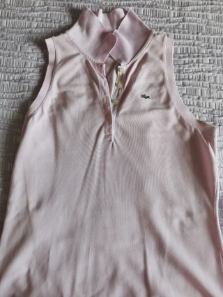 Polo Lacoste rosa T40 sin manga