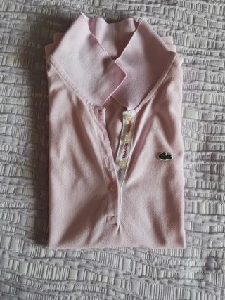 Polo Lacoste rosa T40 sin manga