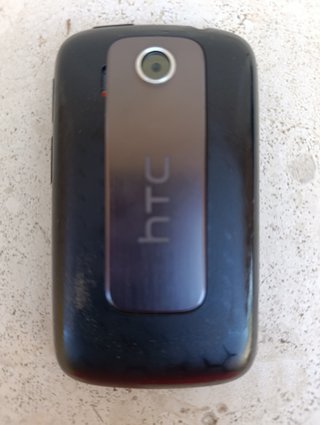 Teléfono móvil HTC Explorer Negro con cargador.