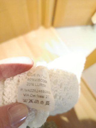 Chaqueta larga de punto blanco hueso