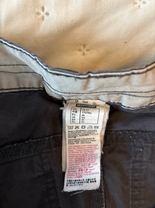 Pantalón Vaquero  Esfera y Pantalón corto Quechua.