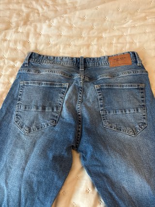 Pantalón Vaquero  Esfera y Pantalón corto Quechua.