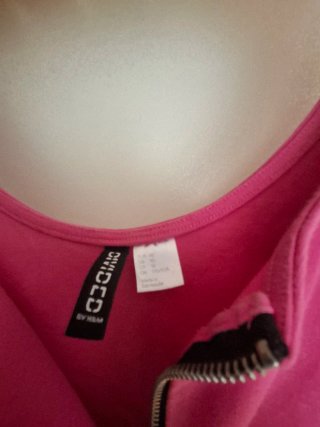 Vestido H&M,Divided L rosa con cremallera delante.