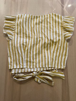 Blusa a rayas amarillas y blancas