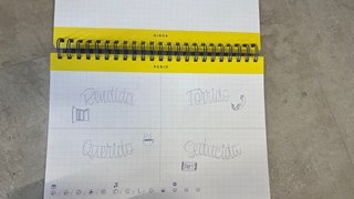 Rotuladores lettering con cuaderno para practicar
