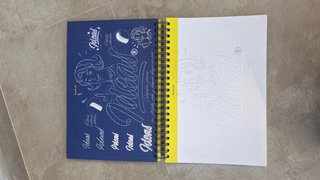 Rotuladores lettering con cuaderno para practicar
