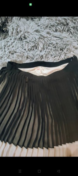 Falda plisada bicolor