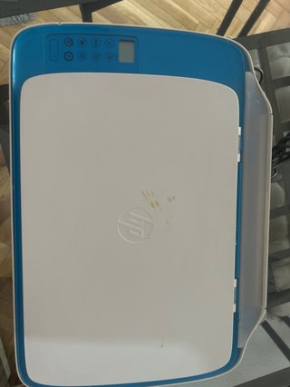 Impresora HP azul y blanca