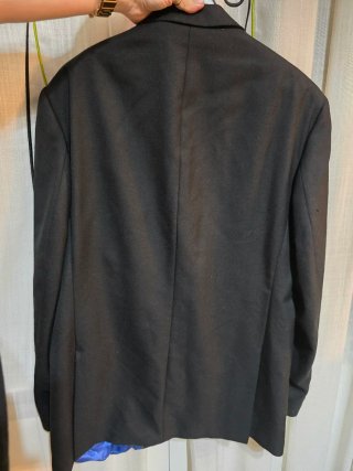 Americana negra larga con forro azul talla 46