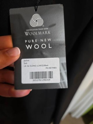 Americana negra larga con forro azul talla 46