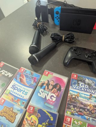 Pack Nintendo switch v2+mandos+micros+9juegos+baul