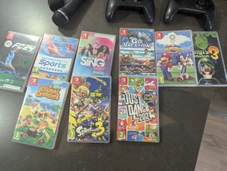 Pack Nintendo switch v2+mandos+micros+9juegos+baul